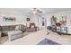 Versatile bonus room offering flexible space with comfortable seating, exercise equipment, and ample natural light at 1155 Rudder Cir, Salisbury, NC 28146