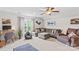 Cozy bonus room featuring a large sectional sofa, a workspace, and plenty of room for relaxation and entertainment at 1155 Rudder Cir, Salisbury, NC 28146