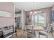 Cozy dining area with a round table, comfortable seating, and ample natural light at 1155 Rudder Cir, Salisbury, NC 28146
