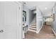 Welcoming entryway with stylish decor, a staircase, and a view into the living room at 1155 Rudder Cir, Salisbury, NC 28146