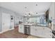 Open kitchen with granite countertops, stainless appliances, view to the living room at 1155 Rudder Cir, Salisbury, NC 28146