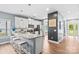 Charming kitchen with granite countertops, stainless appliances, and breakfast bar seating at 1155 Rudder Cir, Salisbury, NC 28146