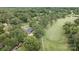 Beautiful home with golf course views, surrounded by lush greenery and mature trees at 120 Pinewood Ln, Rock Hill, SC 29730