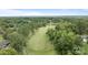 Aerial view of property with manicured golf course surrounded by lush greenery at 120 Pinewood Ln, Rock Hill, SC 29730