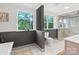 Bathroom featuring tiled shower and commode behind privacy wall at 120 Pinewood Ln, Rock Hill, SC 29730