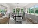 Elegant dining room with large windows, wainscoting, and stylish chandelier at 120 Pinewood Ln, Rock Hill, SC 29730