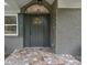 Inviting front entrance with stone details and a stylish, secure front door at 120 Pinewood Ln, Rock Hill, SC 29730