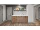 Kitchenette with wood cabinets, light countertops, and subway tile backsplash at 120 Pinewood Ln, Rock Hill, SC 29730