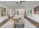 Bright living room featuring comfortable seating, neutral tones, and open access to other rooms at 120 Pinewood Ln, Rock Hill, SC 29730