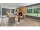 Inviting living room with a stone fireplace, neutral furnishings, and ample natural light, creating a cozy gathering space at 120 Pinewood Ln, Rock Hill, SC 29730