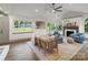 Spacious living room with vaulted ceilings, fireplace, and views of the landscaped yard at 120 Pinewood Ln, Rock Hill, SC 29730