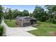 Two-story home featuring garage, covered porch, and well-maintained landscaping at 120 Pinewood Ln, Rock Hill, SC 29730