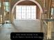 Construction progress of entry doors with an architectural rendering inset at 1200 Andover Rd, Charlotte, NC 28211