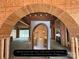 Arched entryway construction progress with an arched reflection showing finished entryway at 1200 Andover Rd, Charlotte, NC 28211