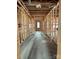 Long hallway with unfinished framing, providing an opportunity for customization and personalization of the space at 1200 Andover Rd, Charlotte, NC 28211