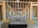 The walk-through scullery offers sleek reeded glass cabinet doors for a touch of contemporary elegance at 1200 Andover Rd, Charlotte, NC 28211