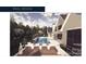 Backyard oasis with a luxurious pool, sun loungers, and lush landscaping at 1200 Andover Rd, Charlotte, NC 28211