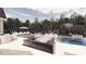 Backyard oasis with a luxurious pool, hot tub, and lush landscaping at 1200 Andover Rd, Charlotte, NC 28211