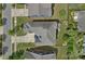 An aerial view of the property shows its layout, manicured backyard, neighboring houses, and proximity to the street at 12214 Bonny Oaks Dr, Cornelius, NC 28031