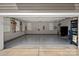Spacious, clean garage with ample storage, perfect for parking and projects at 12214 Bonny Oaks Dr, Cornelius, NC 28031