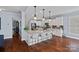 Spacious kitchen featuring a large center island with bar seating, granite counters, and stainless appliances at 12214 Bonny Oaks Dr, Cornelius, NC 28031