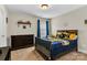 Bedroom with a dark wood furniture, window and university themed decor at 1230 Therns Ferry Dr, Fort Mill, SC 29708