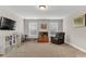 Spacious bonus room with natural light, TV, and comfortable seating at 1230 Therns Ferry Dr, Fort Mill, SC 29708
