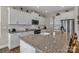 Bright kitchen featuring white cabinets, stainless steel appliances, granite countertops, and a center island at 1230 Therns Ferry Dr, Fort Mill, SC 29708