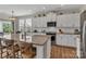Spacious kitchen featuring a large center island, stainless steel appliances, and ample cabinet space at 1230 Therns Ferry Dr, Fort Mill, SC 29708