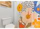 Colorful bathroom with a patterned shower curtain, toilet, and pegboard organization at 12303 Shadow Ridge Ln, Charlotte, NC 28273