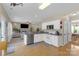 Open kitchen view featuring white cabinets, granite countertops, and stainless steel appliances at 12303 Shadow Ridge Ln, Charlotte, NC 28273