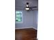 Bright bedroom with hardwood floors, a ceiling fan, and a large window view at 1250 Hampton Grace Ave, Lancaster, SC 29720