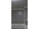 Elegant grey kitchen cabinets with white countertop and backsplash at 1250 Hampton Grace Ave, Lancaster, SC 29720