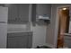 Charming kitchen featuring grey cabinets, white countertops, and a white brick backsplash at 1250 Hampton Grace Ave, Lancaster, SC 29720