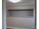 Stylish gray wall feature offers ample shelving and complements the neutral decor at 1250 Hampton Grace Ave, Lancaster, SC 29720