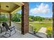 Inviting front porch view with a rocking chair offering a relaxing outdoor space at 141 Tall Fern Loop, Mooresville, NC 28117