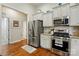 Modern kitchen featuring stainless steel appliances and granite countertops at 141 Tall Fern Loop, Mooresville, NC 28117