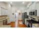 Modern kitchen featuring stainless steel appliances and beautiful granite countertops at 141 Tall Fern Loop, Mooresville, NC 28117