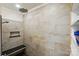 This walk-in shower features a rain shower head, hand shower, and a built-in bench at 141 Tall Fern Loop, Mooresville, NC 28117