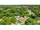 Drone view of a neighborhood showcasing mature trees at 146 Georgia Sw St, Concord, NC 28025