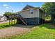 Charming home featuring a cozy wooden deck and an inviting gravel space perfect for outdoor relaxation at 146 Georgia Sw St, Concord, NC 28025