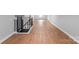 Finished basement with hardwood floors and a staircase at 146 Georgia Sw St, Concord, NC 28025