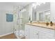 Bright bathroom featuring glass shower, marble vanity top, and modern fixtures at 146 Georgia Sw St, Concord, NC 28025