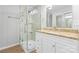 Bright bathroom featuring a glass shower and granite vanity top at 146 Georgia Sw St, Concord, NC 28025