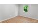 This bedroom has hardwood floors, closet, and window for natural light at 146 Georgia Sw St, Concord, NC 28025