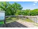 Wooden deck overlooking a private, wooded backyard at 146 Georgia Sw St, Concord, NC 28025