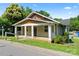 Delightful single-story home with a charming covered porch and fresh, neutral siding at 146 Georgia Sw St, Concord, NC 28025