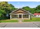 Attractive single-story house featuring a welcoming covered front porch and well-maintained landscaping at 146 Georgia Sw St, Concord, NC 28025