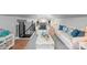 Bright living room with modern decor, comfortable seating, and a staircase at 146 Georgia Sw St, Concord, NC 28025