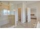 Open bathroom featuring a glass shower, neutral walls, and easy access to other rooms at 15216 Shallow Ridge Rd, Charlotte, NC 28278